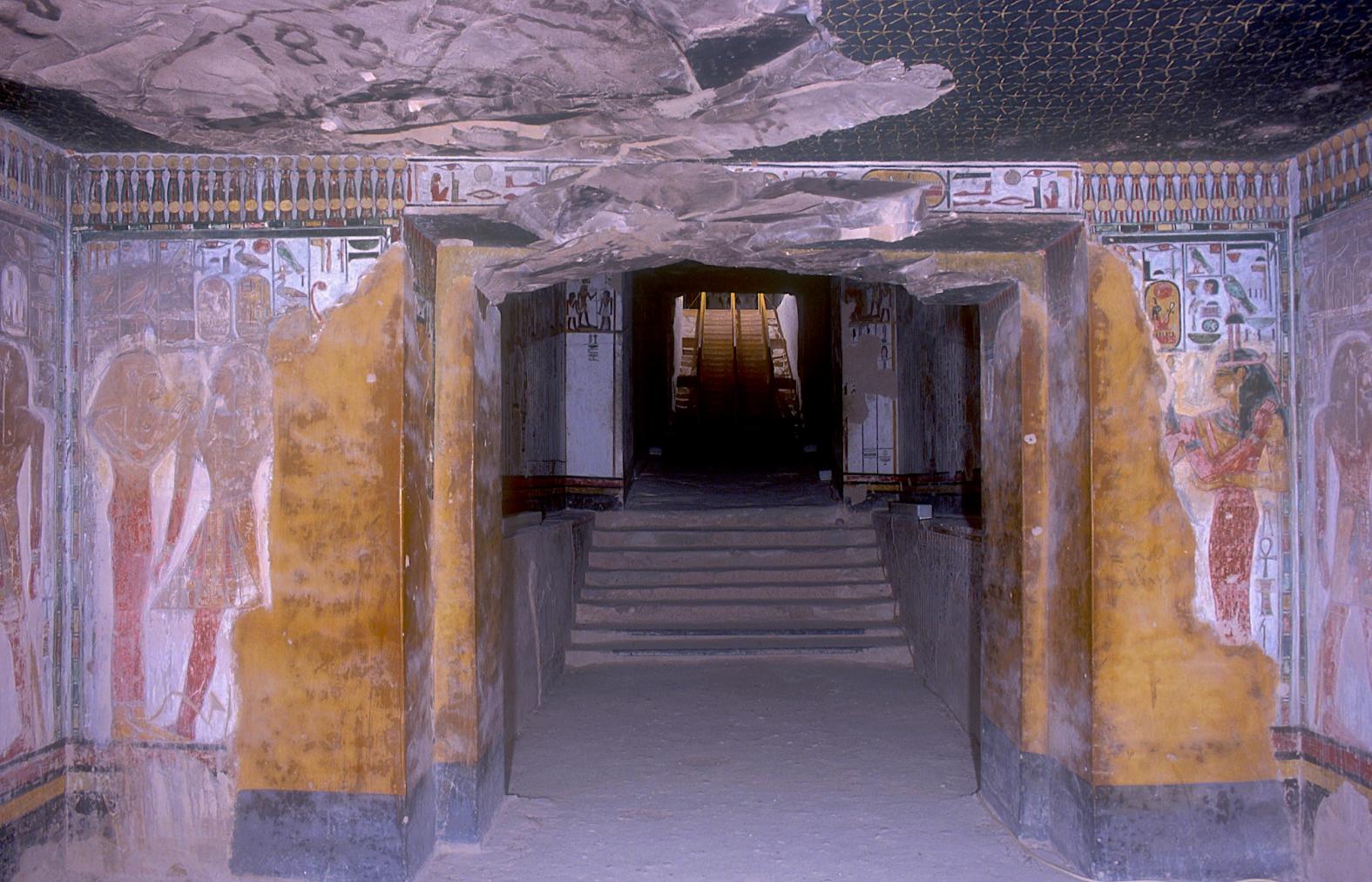 Sety I with two forms of Hathor, and Carter's repairs in brick of damaged walls; stairs leading in the direction of tomb entrance.