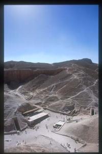 Valley of the kings, panorama, looking east from cliff above KV 07, showing entrances to KV 06, KV 07, KV 55, KV 18, KV 17, KV 16,  KV 62, KV 10, KV 09,  KV 11 and tourist shelter.